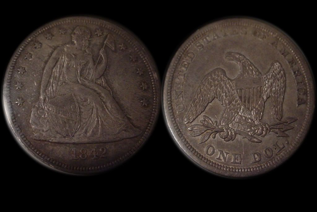 1842LibertySeatedDollarInhand.jpg