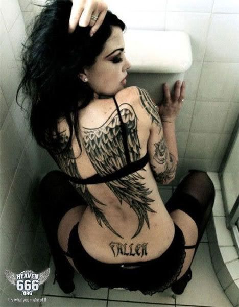  Tattooed chick in black Pictures Images and Photos