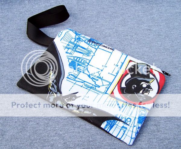 This listing is for an awesome Batman with The Penguin Clutch made 